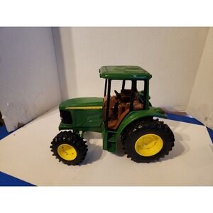 Ertl John Deere Tractor Toy Model 0910 Rubber Big Tires Plays Tractor Brown Seat
